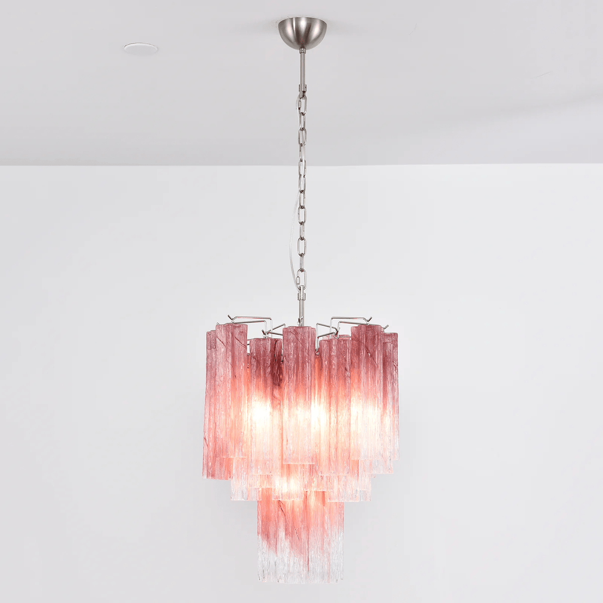 Veluora kroonluchter met roze-naar-kleureloos gradient Murano-glas in lagen