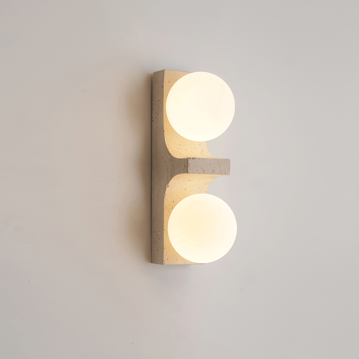 Umiren wandlamp van geel travertin