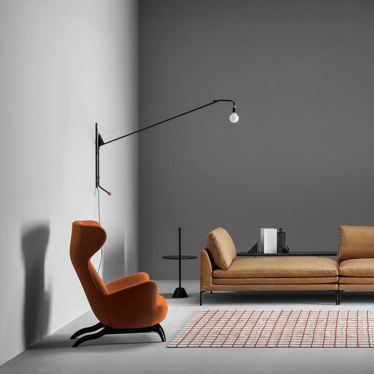 Zwarte wandlamp met lange arm