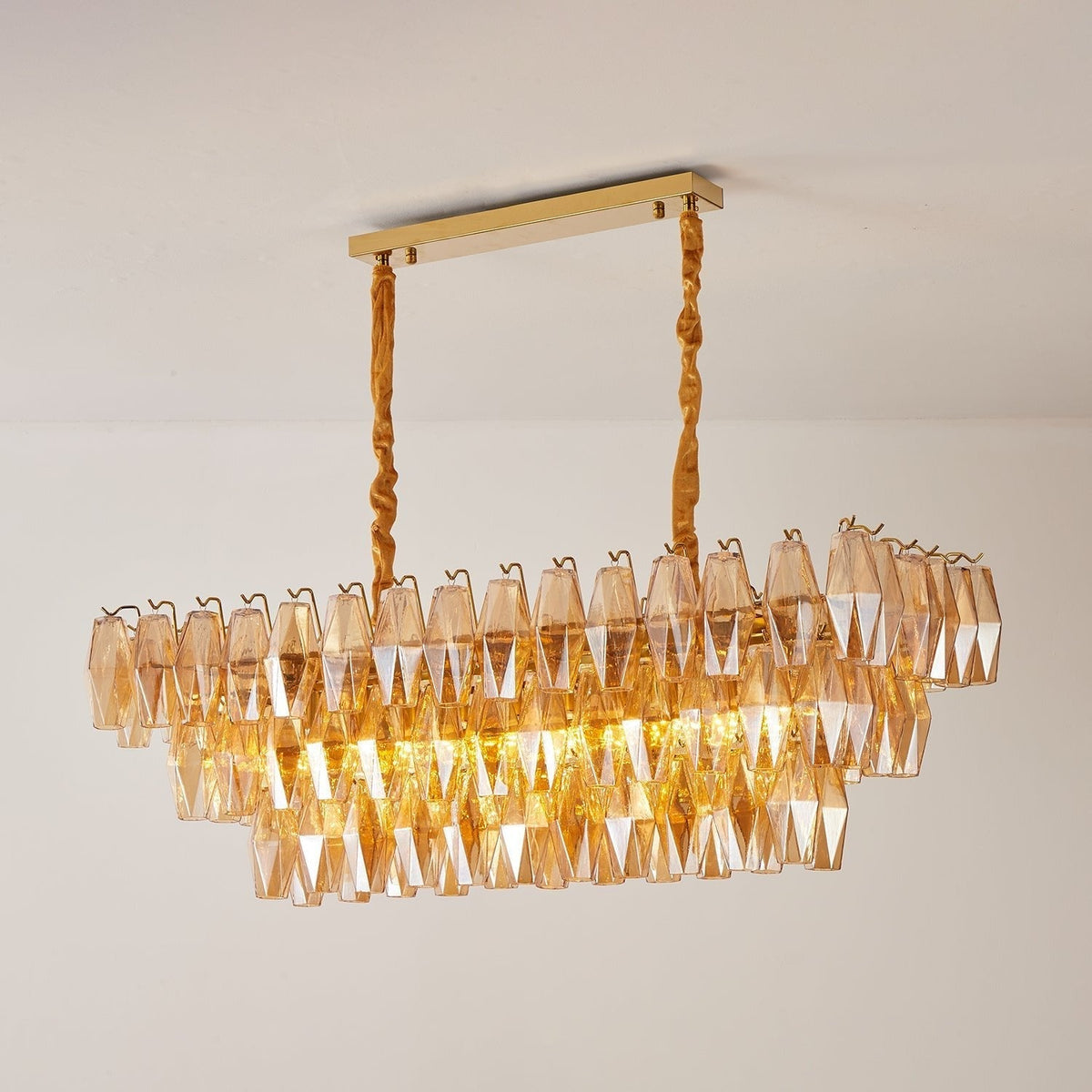 Lioraiel kroonluchter van glas met amberprismeglas in lagen rechthoekig