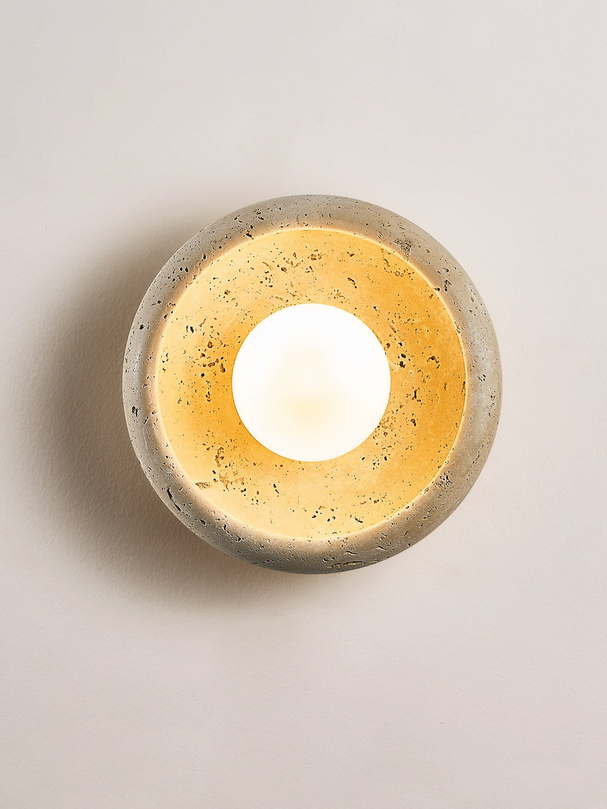 Valiselle wandlamp in Geel travertin
