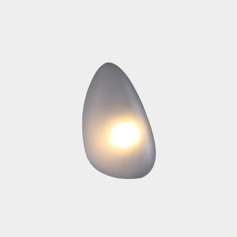 Eirinina wandlamp met bolvormig glas