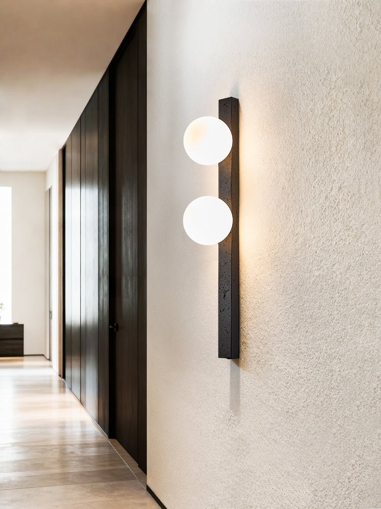 Zoshaira bollen Zwart travertin wandlamp