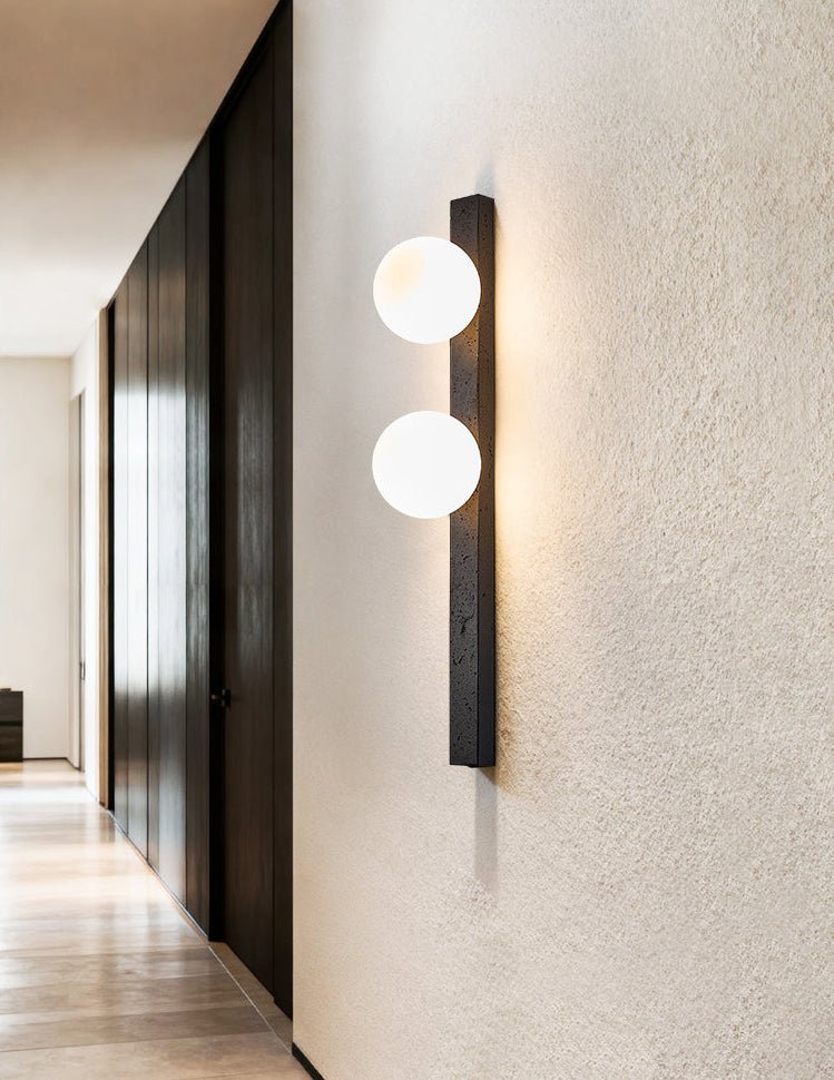 Zoshaira bollen Zwart travertin wandlamp