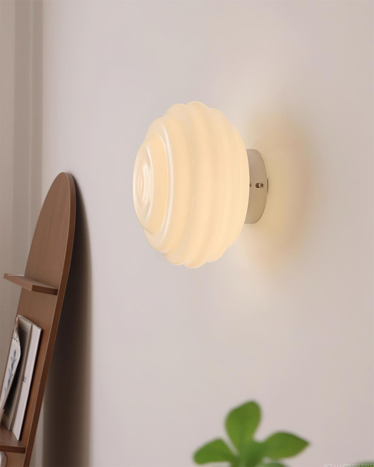 Celalelle wandlamp met glas in goudkleurige afwerking