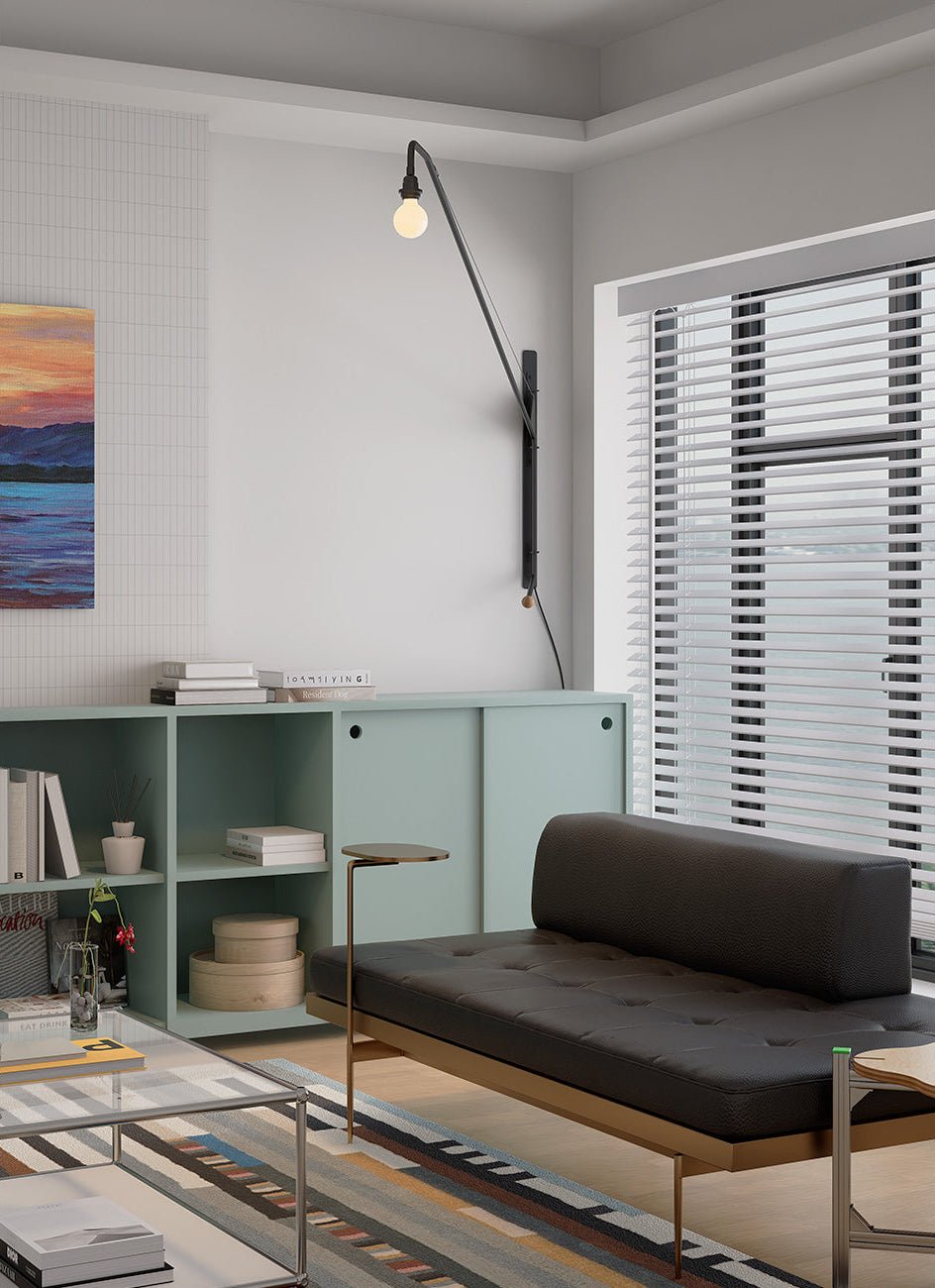 Zwarte wandlamp met lange arm