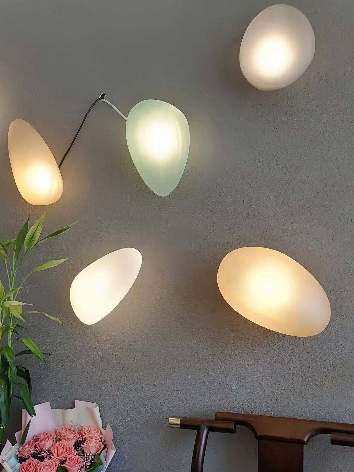 Eirinina wandlamp met bolvormig glas
