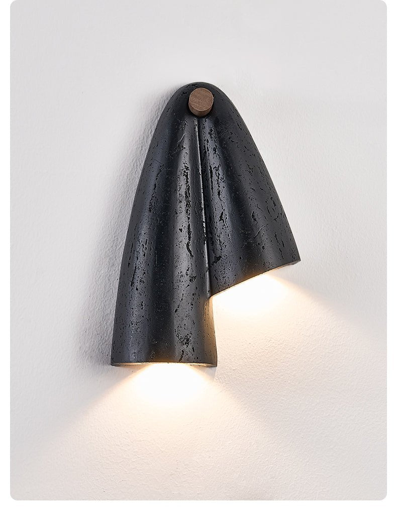 Kora Moderne wandlamp van zwart travertin