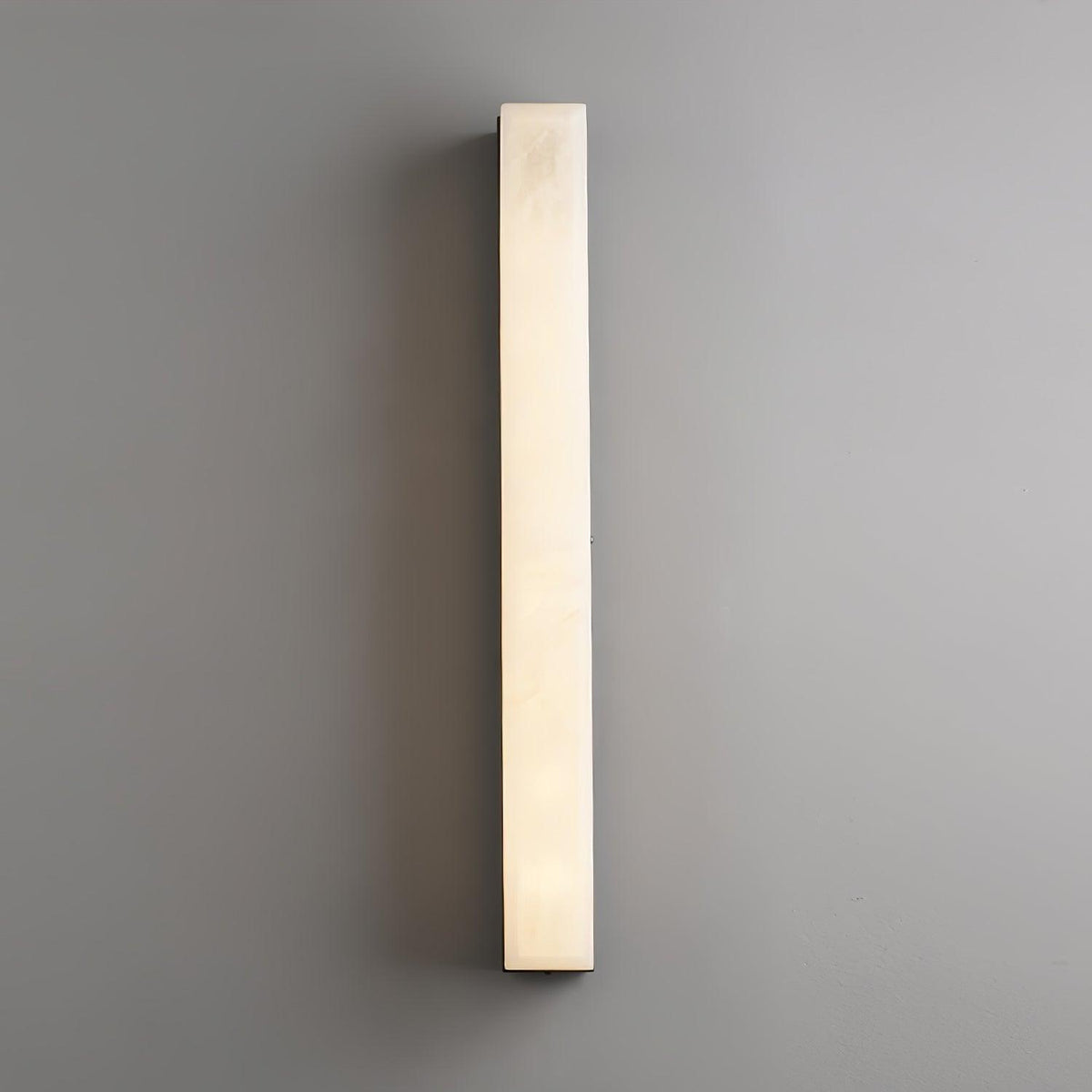 Quill wandlamp van messing met albasten kap