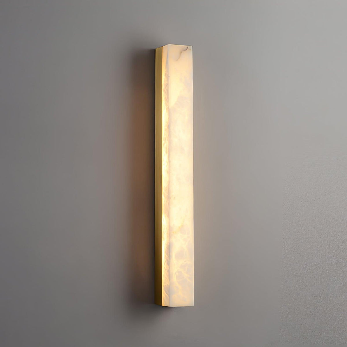 Quill wandlamp van messing met albasten kap