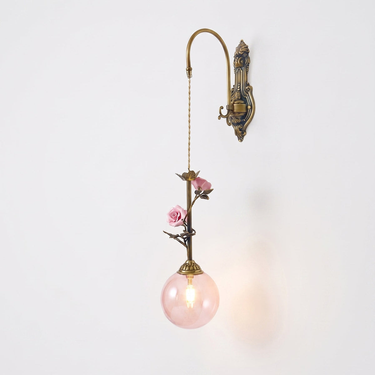 Elaararia wandlamp met antieke afwerking en roze