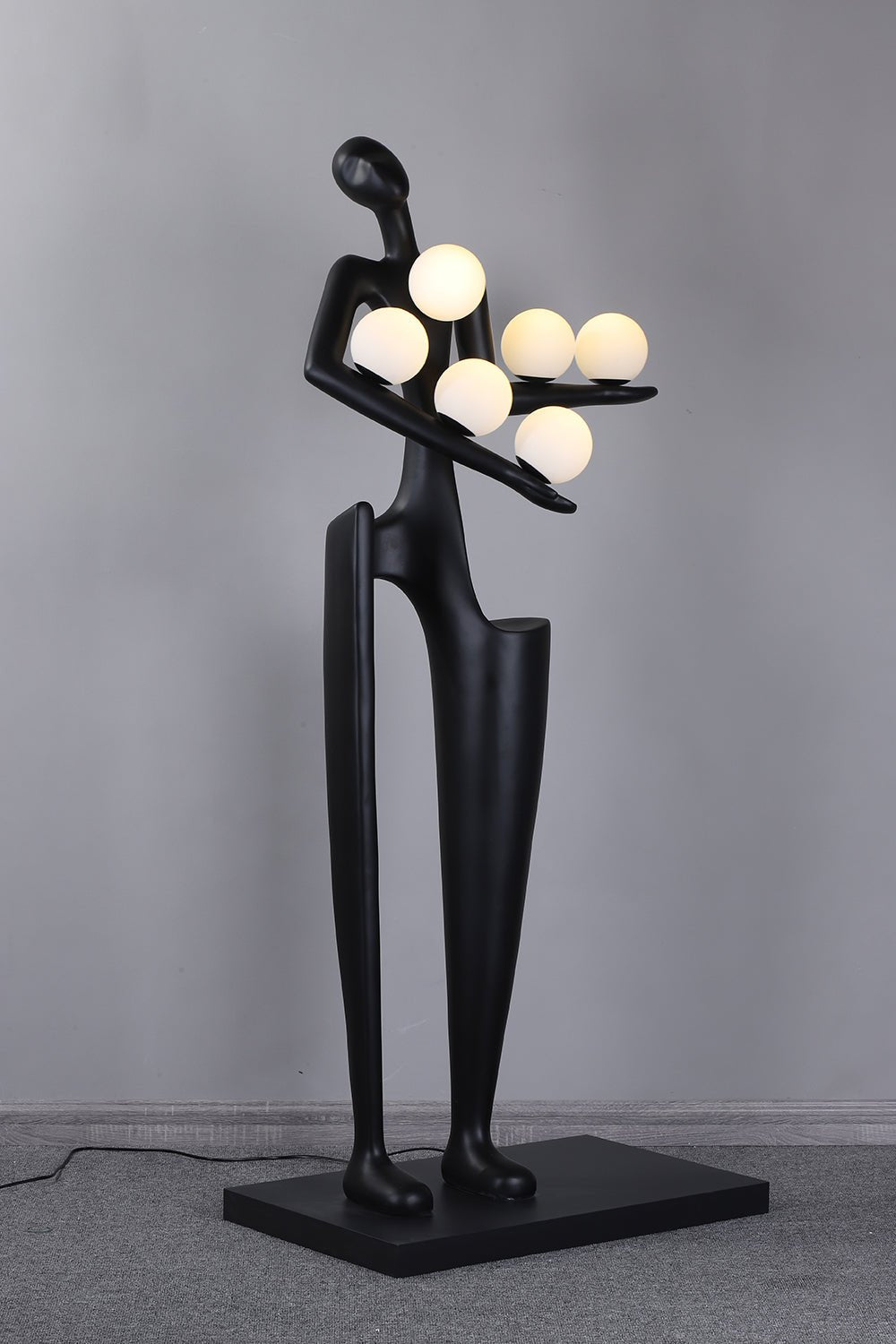 Viraeette kunststof vloerlamp in artistiek ontwerp