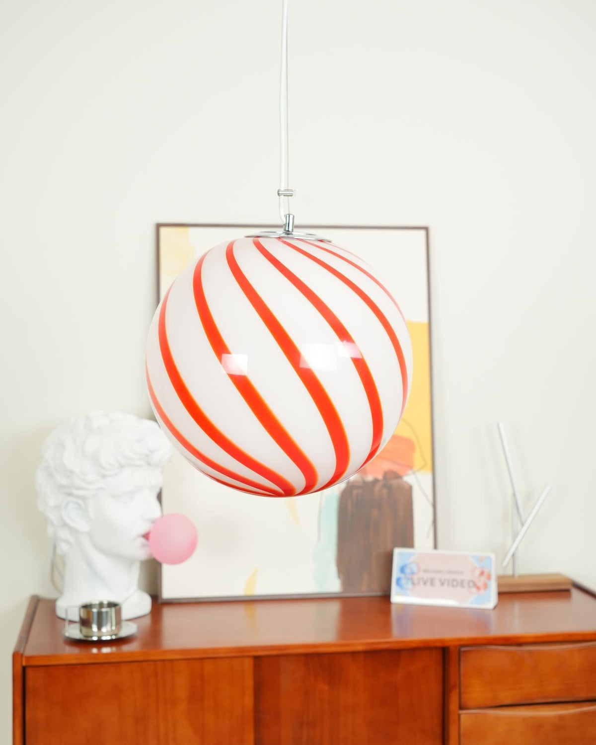 Kairo hanglamp met glazen bol en groene spiraalstrepen