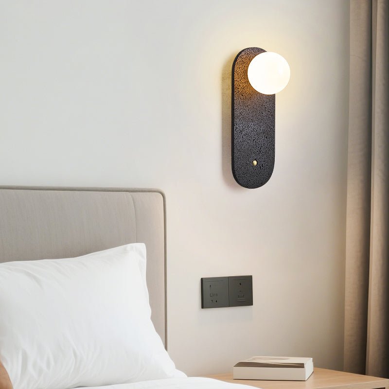 Taveella zwarte wandlamp in travertin