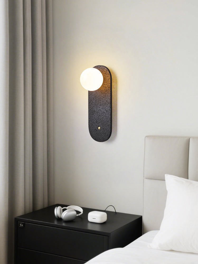 Taveella zwarte wandlamp in travertin