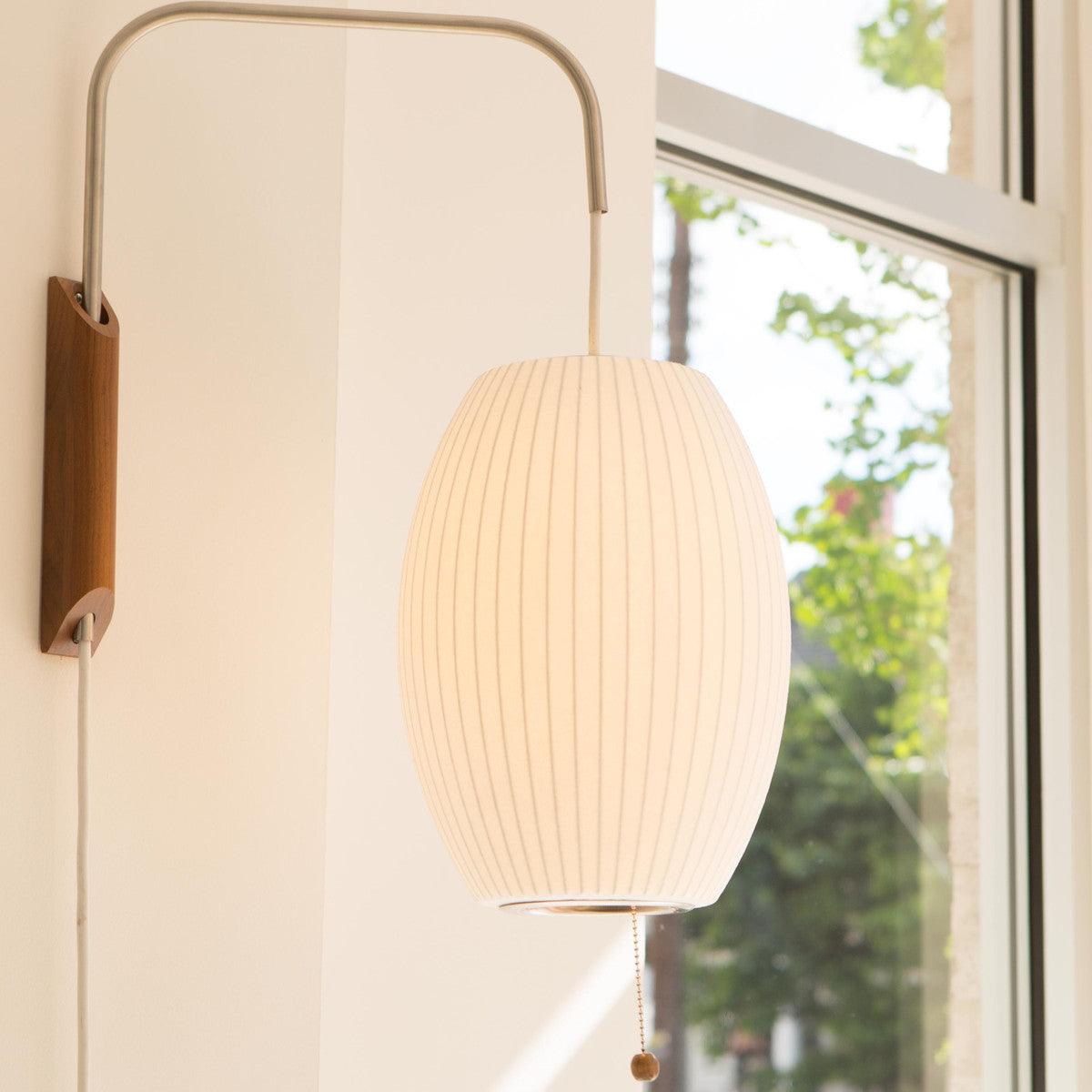 Aldinira wandlamp walnoot bal