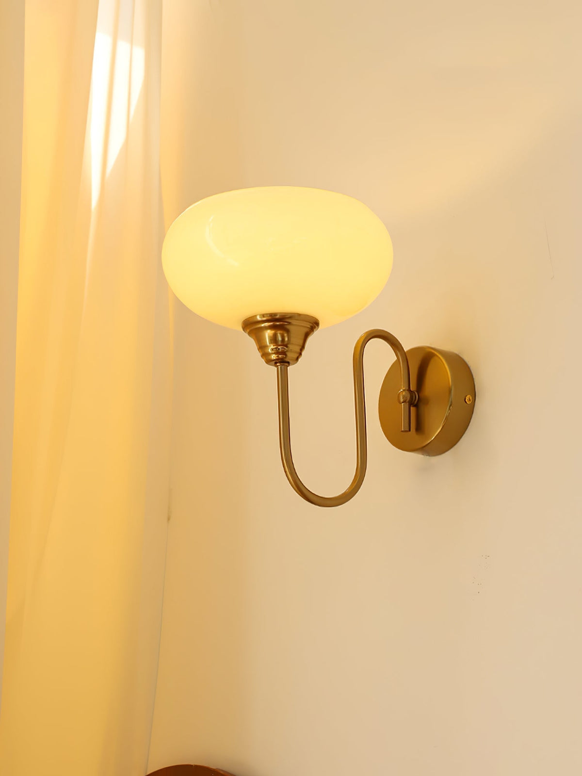 Ophaan wandlamp