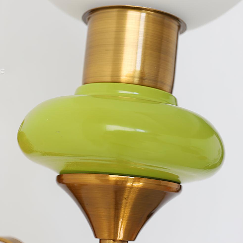 Teriearia wandlamp goudkleurige afwerking met groene accenten