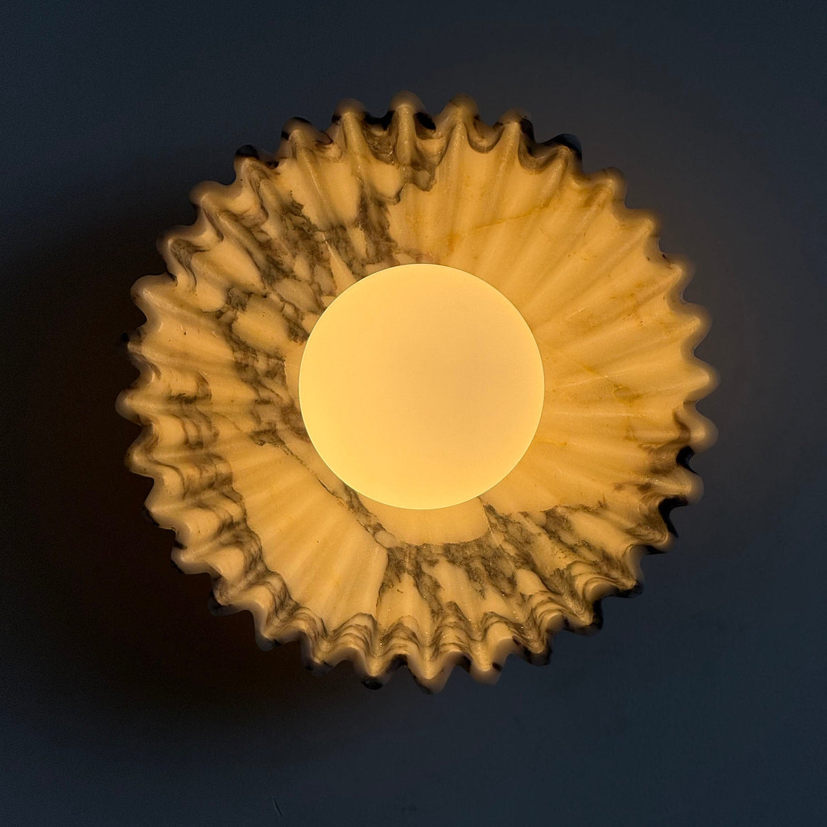 Soraaria wandlamp met afwerking