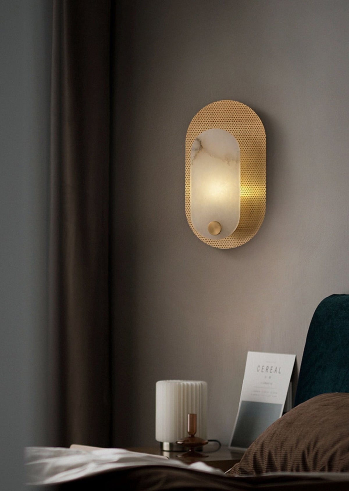 Perforated ovaal wandlamp in albast