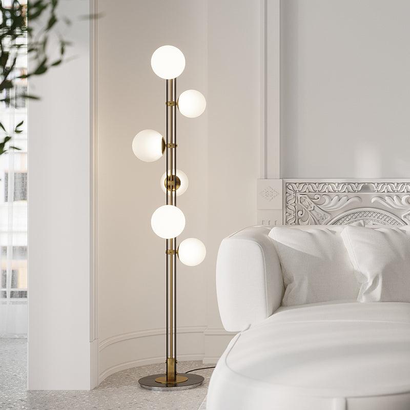 Eireneria elegante vloerlamp met glazen kap