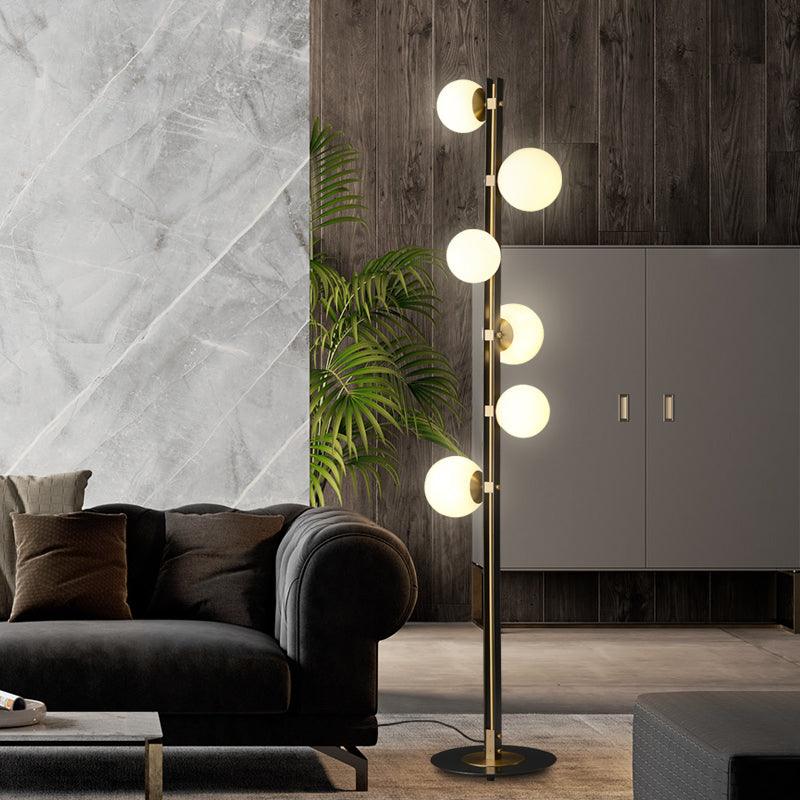 Eireneria elegante vloerlamp met glazen kap