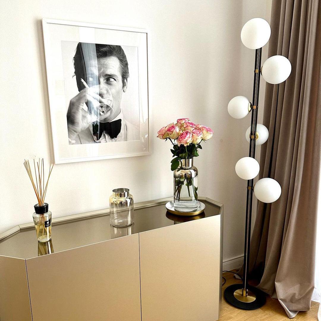 Eireneria elegante vloerlamp met glazen kap