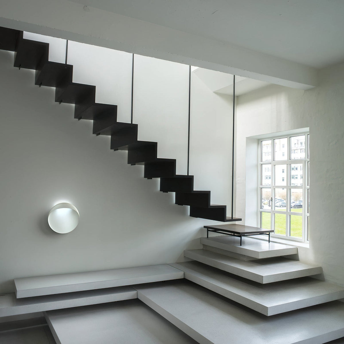 Flindt ronde wandlamp in aluminium