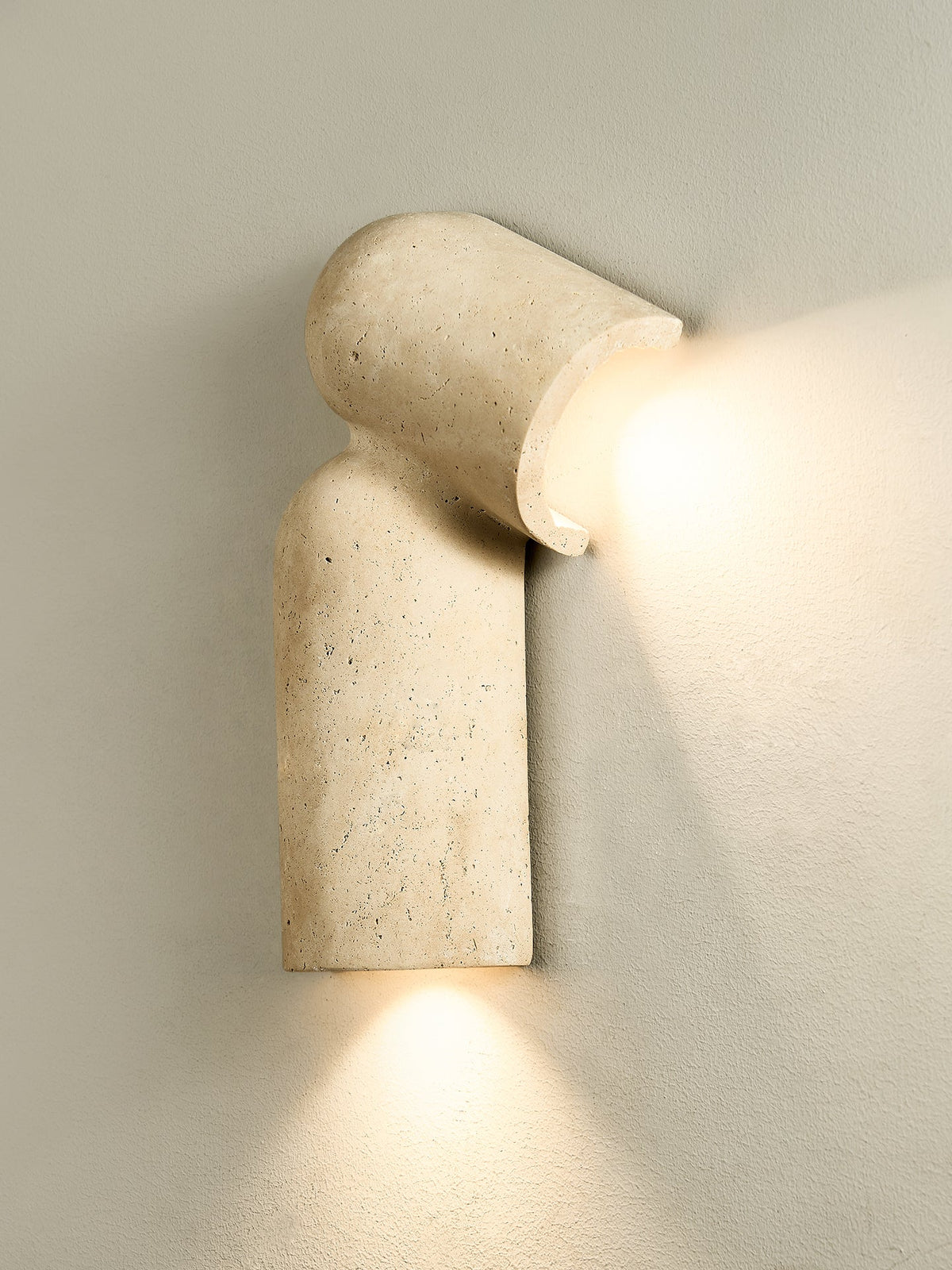 Alma wandlamp in geel travertin