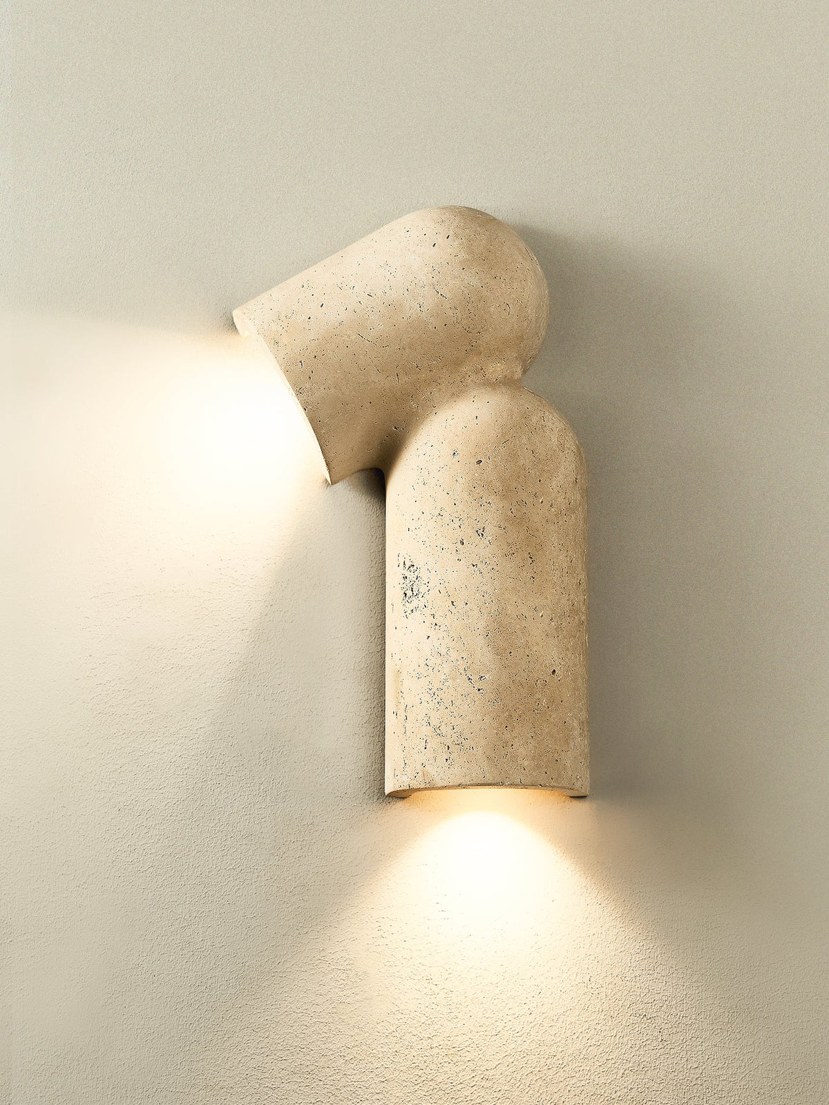 Alma wandlamp in geel travertin