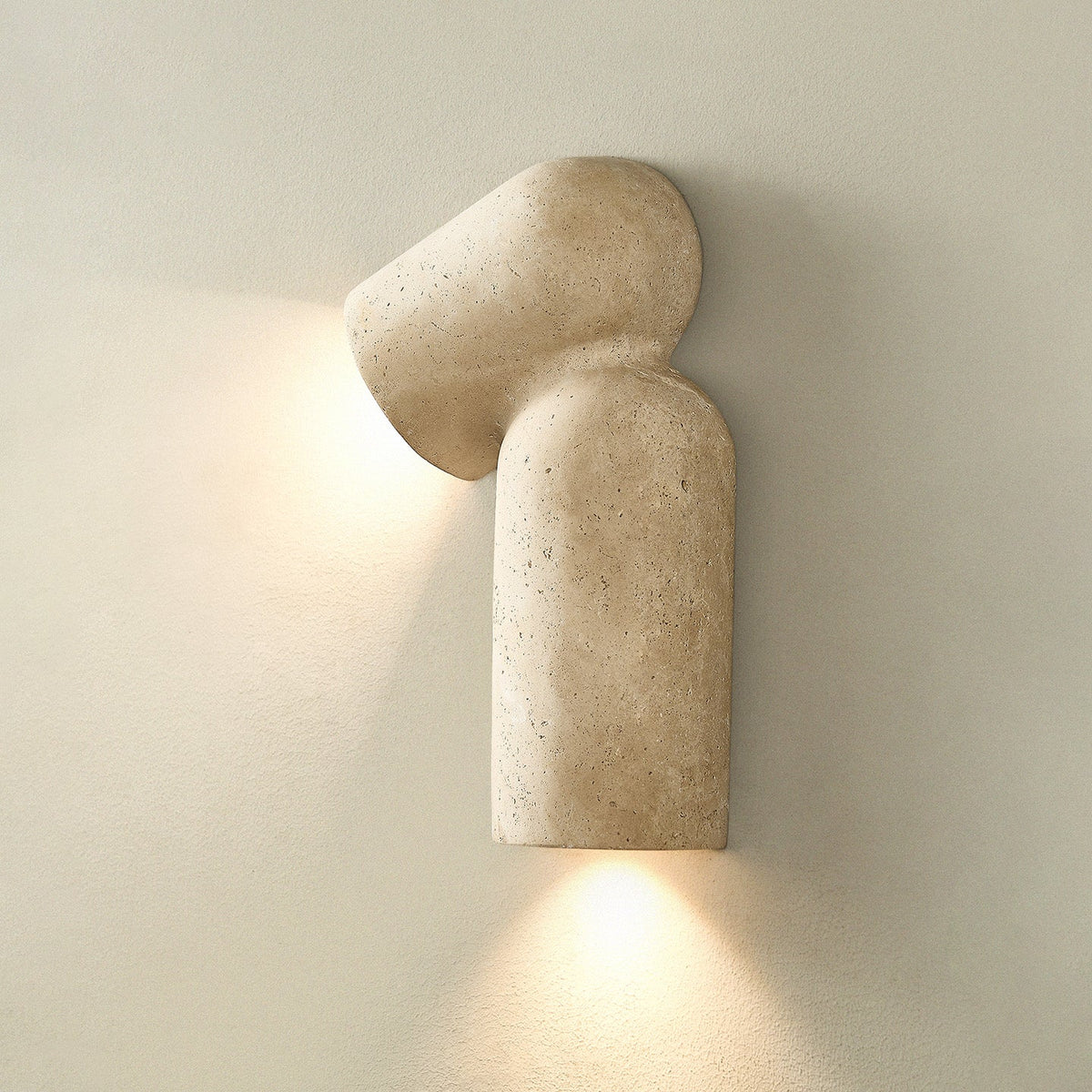 Alma wandlamp in geel travertin