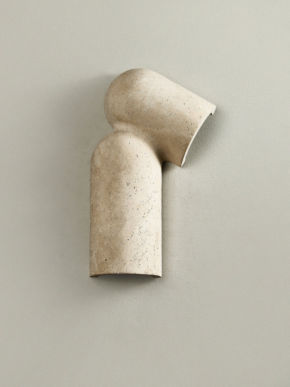 Alma wandlamp in geel travertin