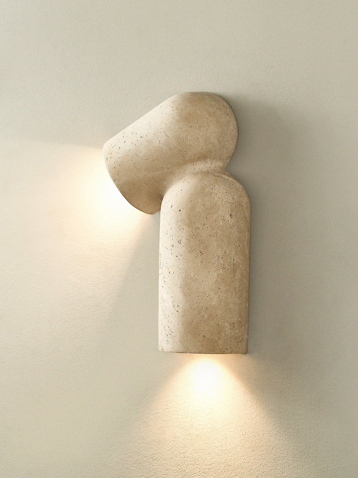Alma wandlamp in geel travertin