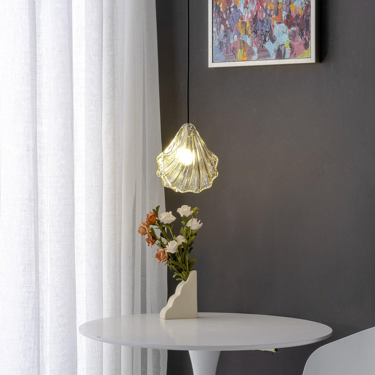 Veda hanglamp van glas met schelpontwerp, artistiek en elegant