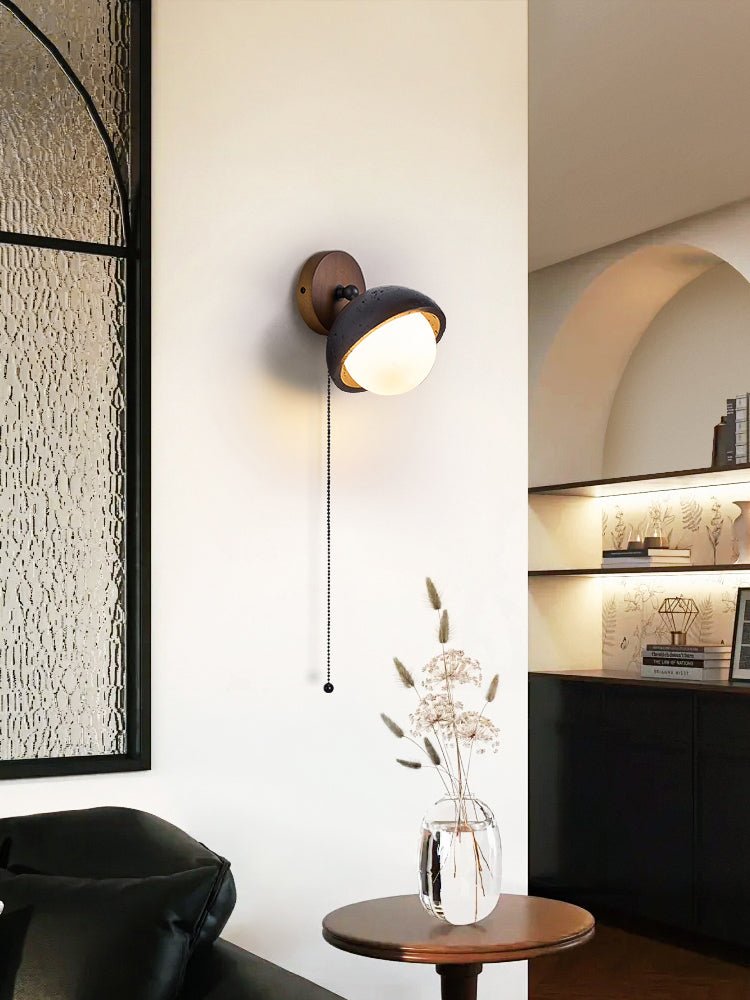 Serenaria bollen Zwart travertin Draaibaar wandlamp