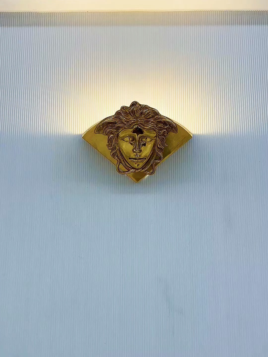 Sphinx messing wandlamp
