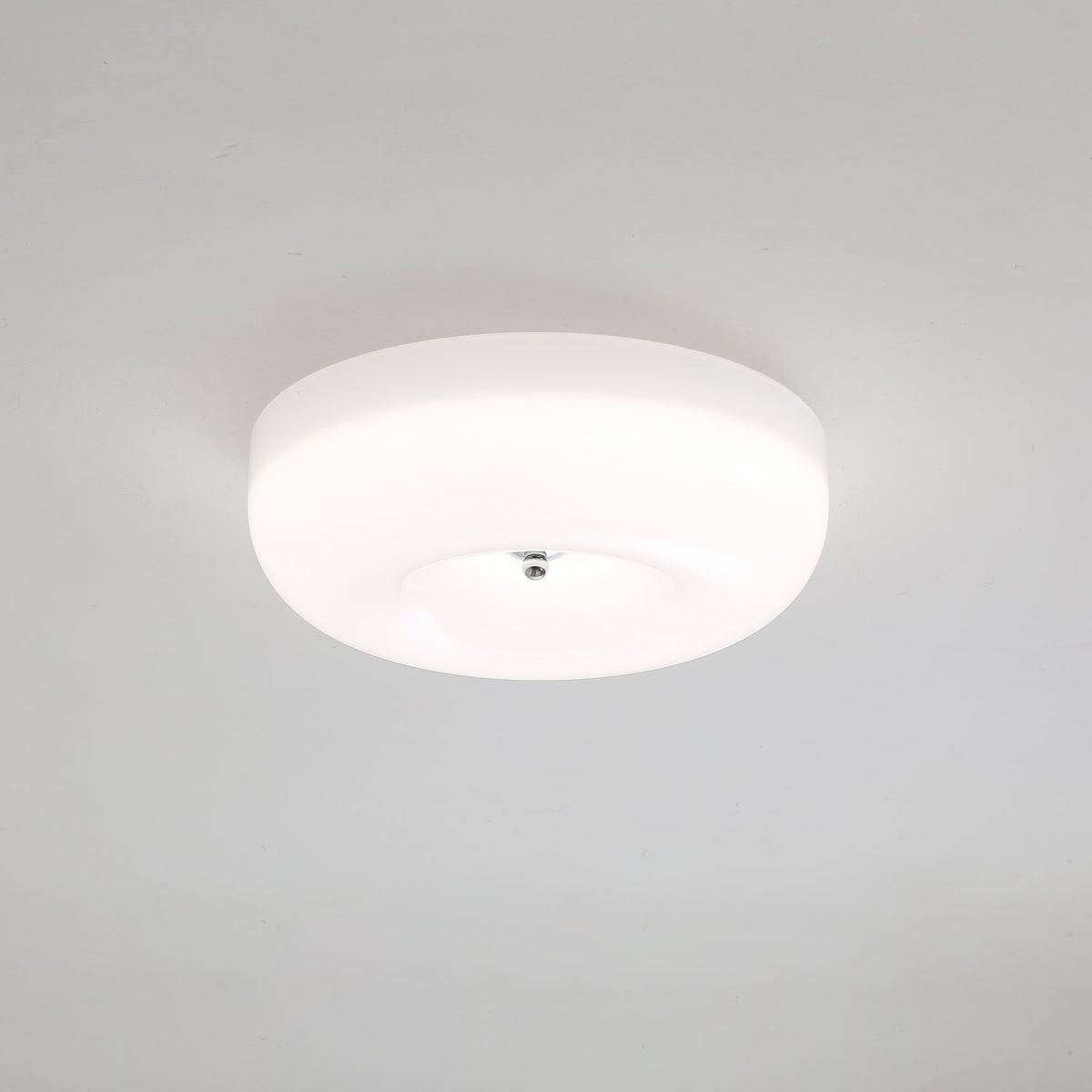 Cam Moderne plafondlamp van glas met minimalistisch swirl-ontwerp