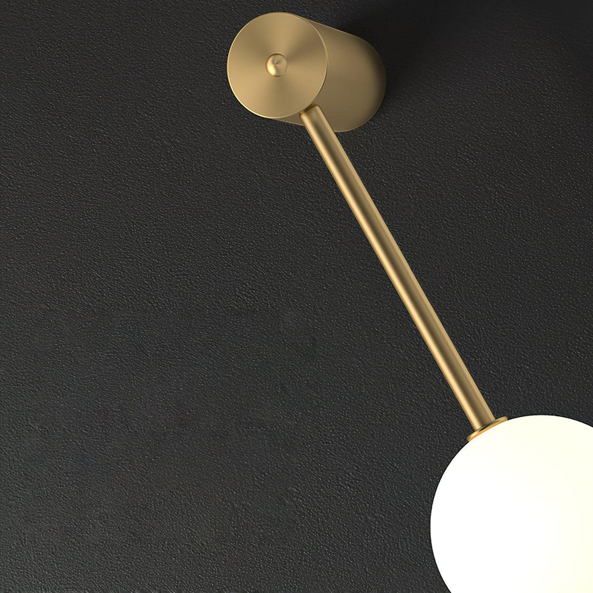 Soloiella wandlamp met verticale bollen van messing