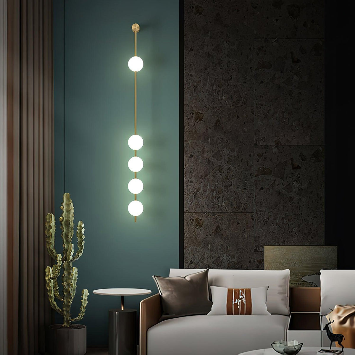 Soloiella wandlamp met verticale bollen van messing