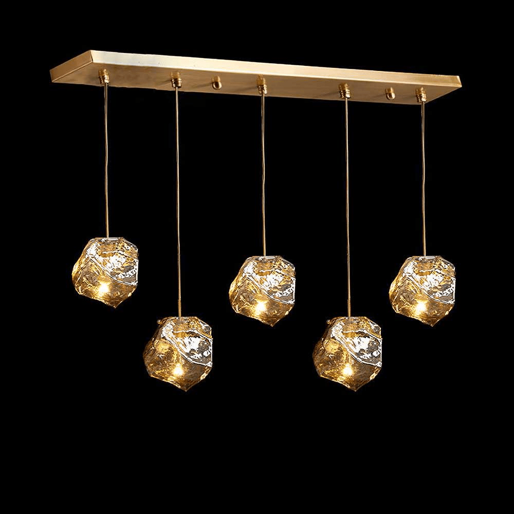 Kixu Luxe hanglamp van messing met amberkleurige kap