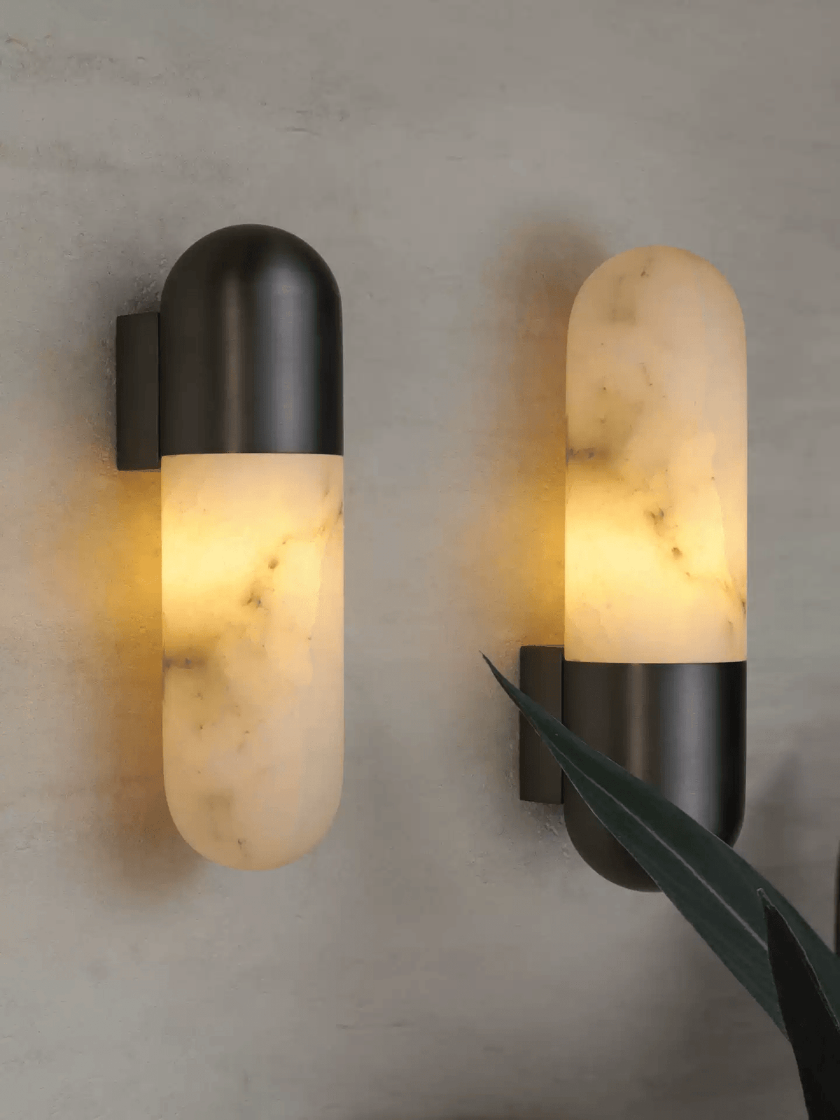 Lucan Capsule albasten wandlamp