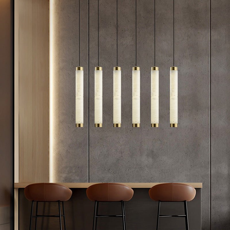 Lira cilindrische hanglamp van albast met goudkleurige afwerking