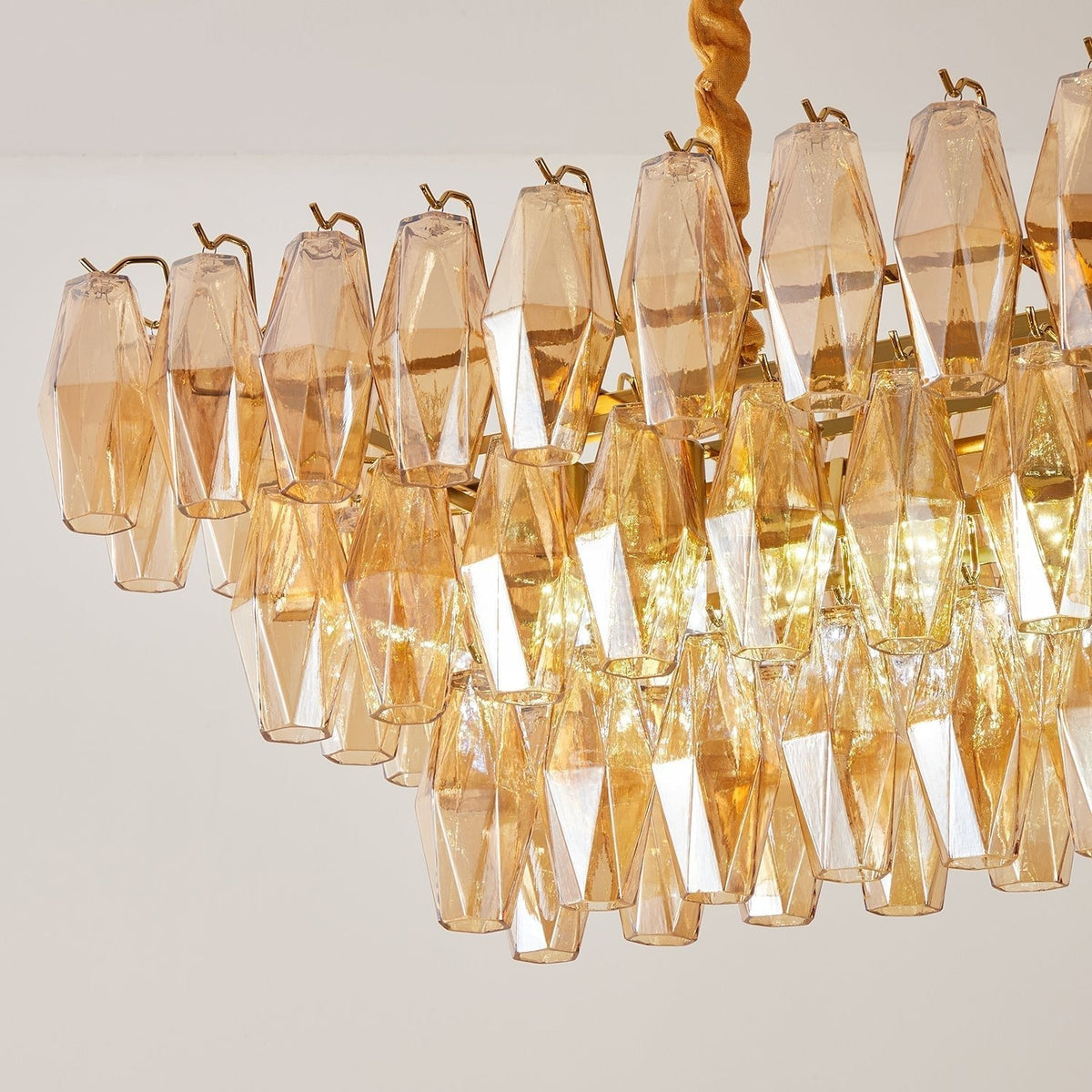 Lioraiel kroonluchter van glas met amberprismeglas in lagen rechthoekig