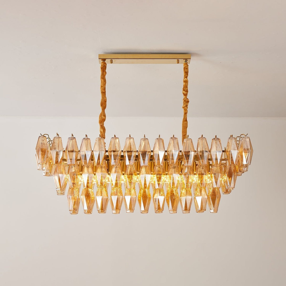Lioraiel kroonluchter van glas met amberprismeglas in lagen rechthoekig