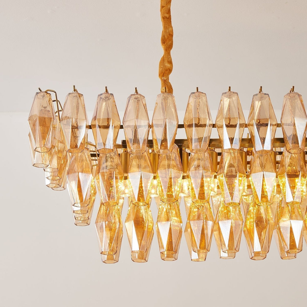 Lioraiel kroonluchter van glas met amberprismeglas in lagen rechthoekig