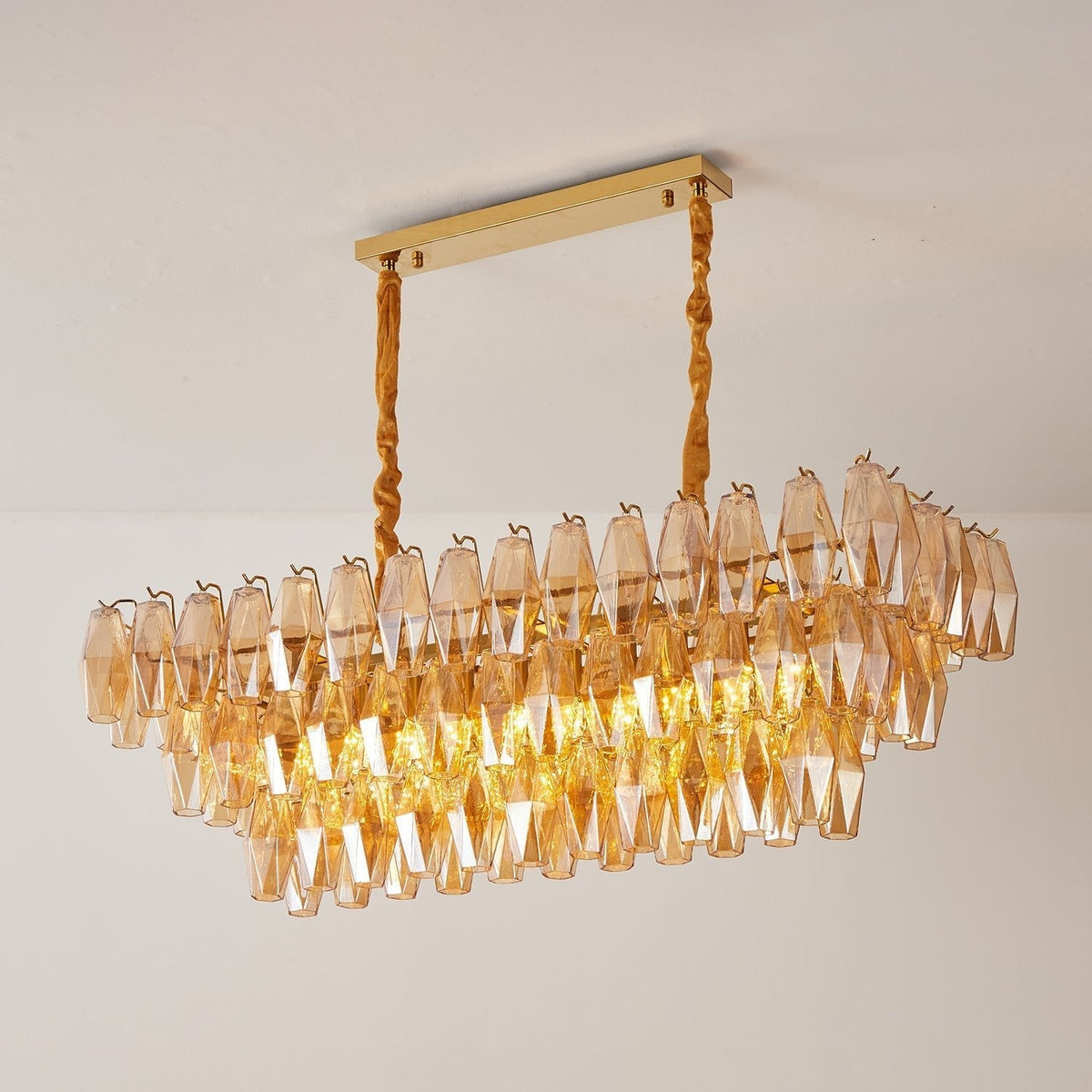 Lioraiel kroonluchter van glas met amberprismeglas in lagen rechthoekig