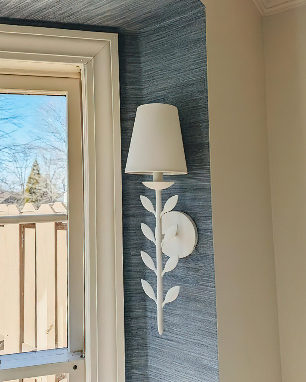 Evoque wandlamp met goudbladeren afwerking en stoffen kap