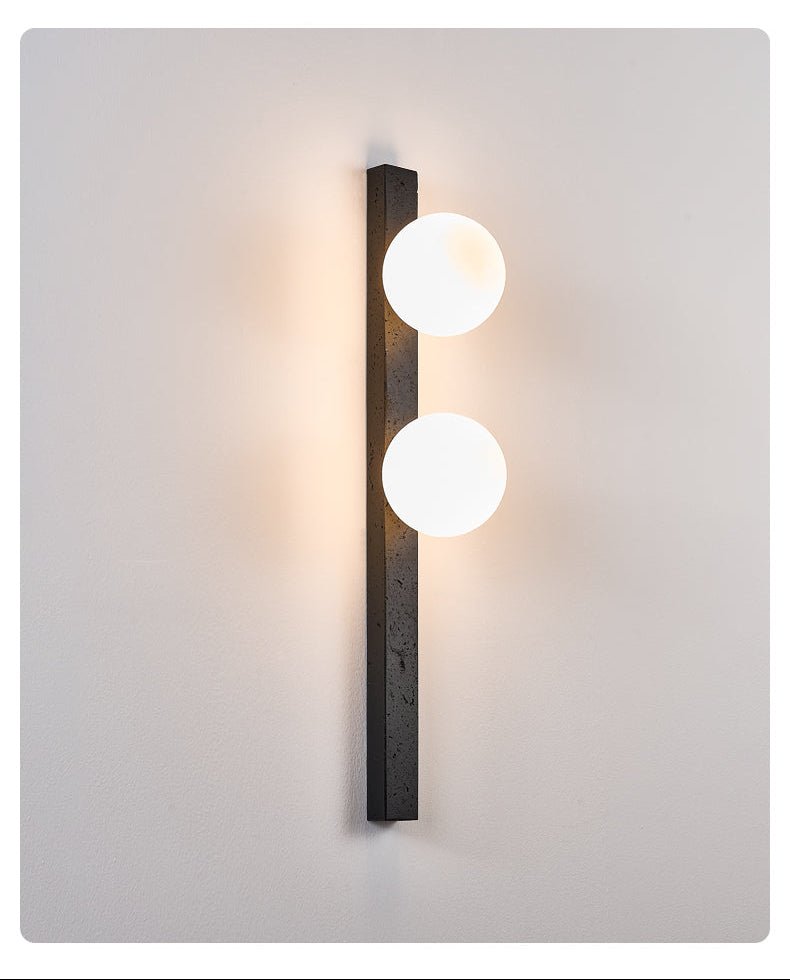 Zoshaira bollen Zwart travertin wandlamp