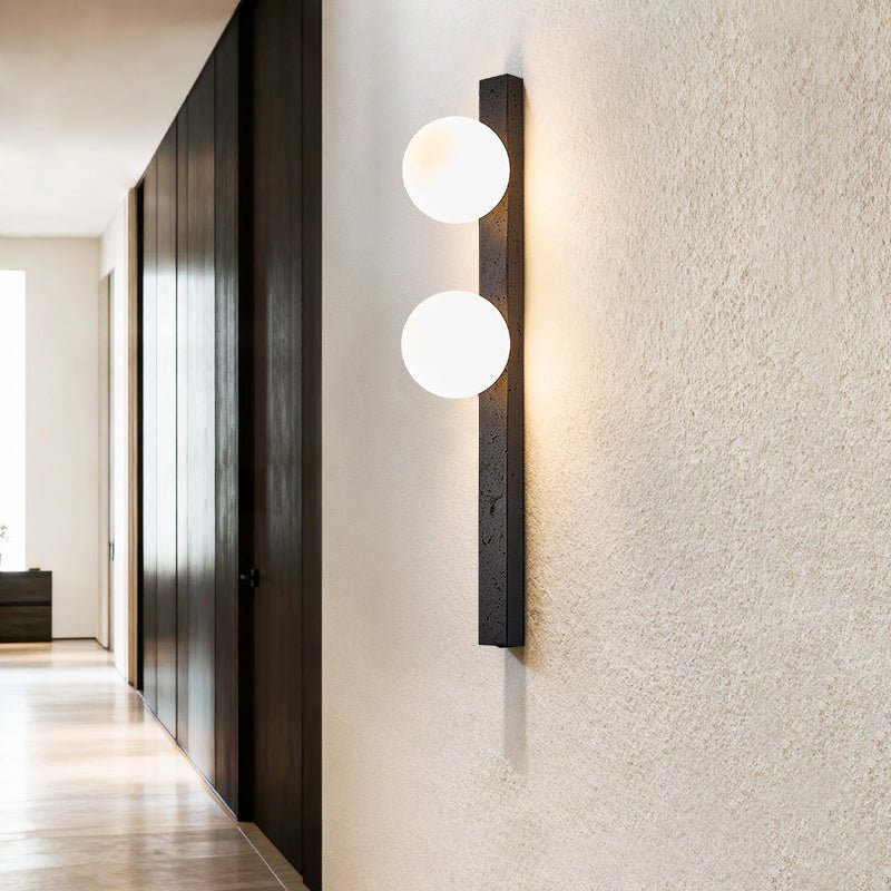 Zoshaira bollen Zwart travertin wandlamp