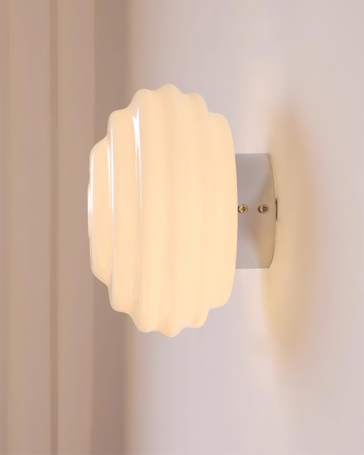 Celalelle wandlamp met glas in goudkleurige afwerking